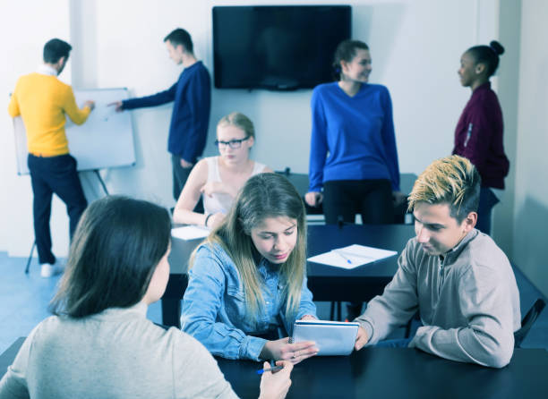 istock Girl consulting fellow student 1053450014