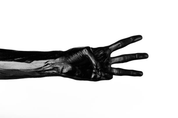 istock Black hand on white background, isolated, paint 1053453700