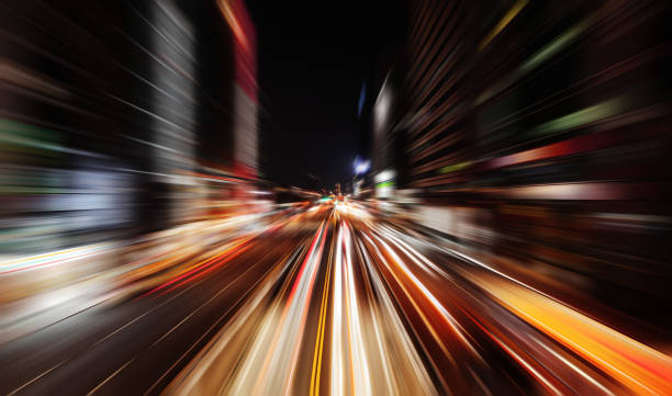 istock Modern street at night with traffic lights 1053457016