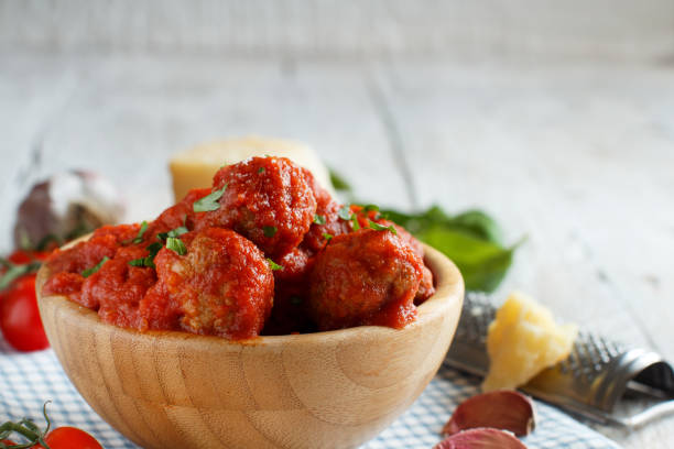 istock Fresh fried meatballs in a tomato sauce 1053458114