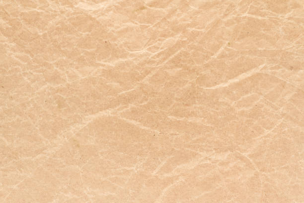 istock Brown wrinkle recycle paper background 1053462368