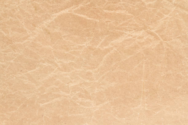 istock Brown wrinkle recycle paper background 1053462462