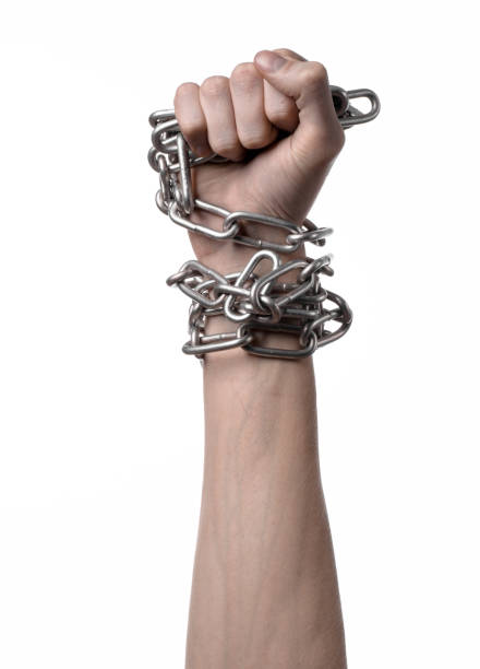 istock Social theme: hands tied a metal chain on a white background 1053465712