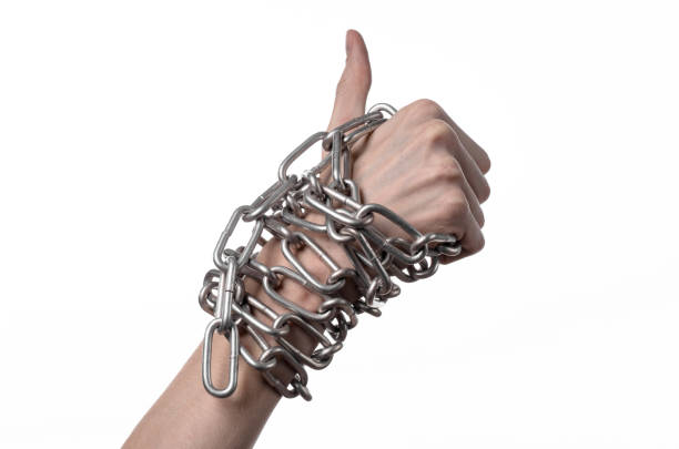 istock Social theme: hands tied a metal chain on a white background 1053466122