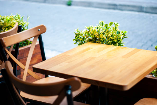 Tables and chairs sidewalk bar and cafe outdoor, patio and dining materials restaurants tables and chairs stock pictures, royalty-free photos & images
