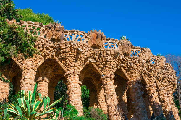 istock Arches against blue sky in Park Guell in Barcelona, Spain 1053469658