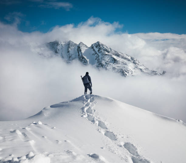 hiking in the mountains - travel adventure winter cold imagens e fotografias de stock