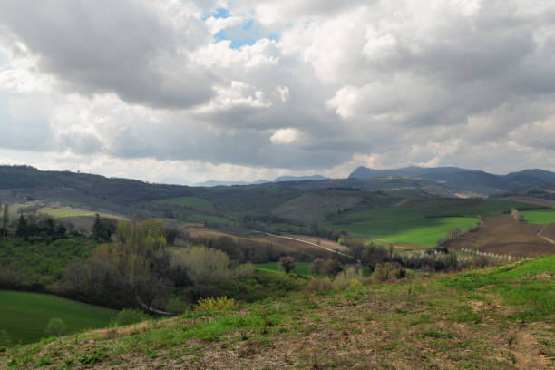 istock Rural landscape view, hills and fields on spring day 1053481622