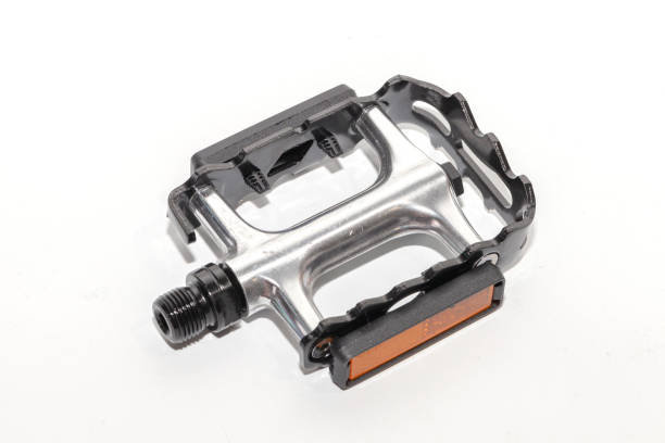 istock close up of bicycle pedal on white background 1053485778