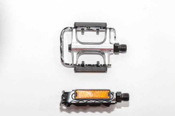 istock close up of bicycle pedal on white background 1053485948