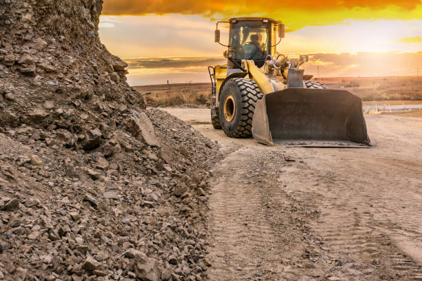 istock An excavator in a mine with rock for further processing 1053497256