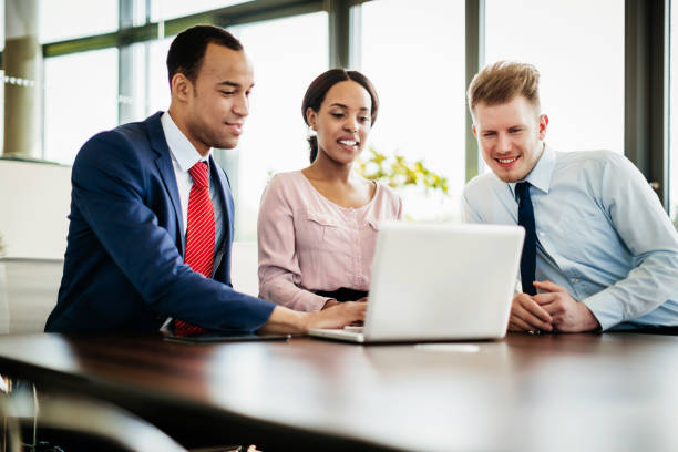 istock Team Leaders Reviewing Business Forecast 1053501554
