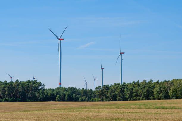 istock wind turbines / windmills in rural landscape - renewable energy - 1053501816