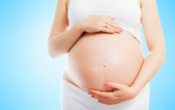 istock A cute pregnant belly 1053502612