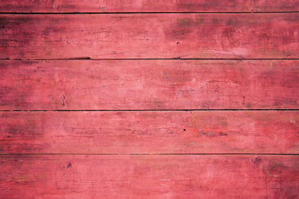 istock Grunge red wood door textured background 1053505092