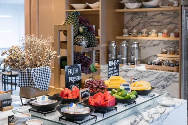 istock Healthy fresh breakfast fruit in restaurant hotel with grapes, watermelon and pineapple prepare for fresh pressed juice. 1053510020