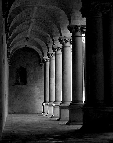 Monastero degli Olivetani (Lecce, Puglia, Italy), colonnade of the cloister.\nOlivetan Monastery (Lecce, Apulia, Italy), cloister colonnade.