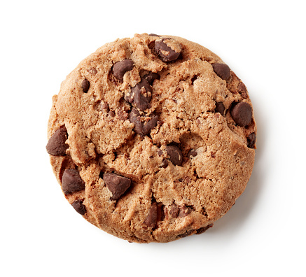 Dark chocolate chip cookie isolated on white bakcground, top view