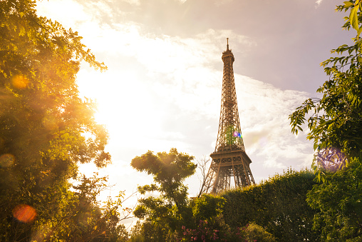 Eiffel Tower under sunlight in Paris, France. Horizontal composition.