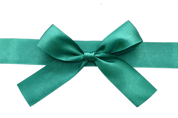 istock A holiday background with green ribbon and bow 1053522272