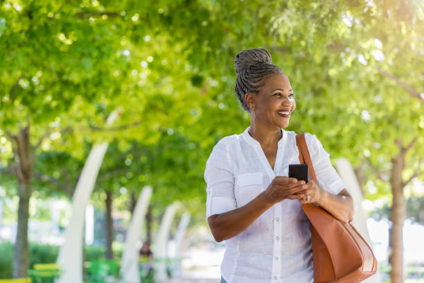 istock Confident senior women walking in park 1053526422