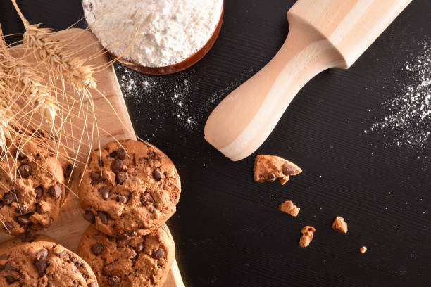 istock Biscuits with chocolate chips on black table top homemade 1053527578