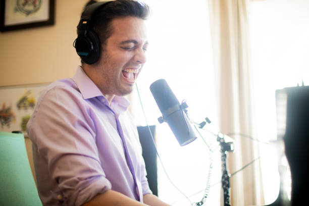 istock Piano Music Streamer Singing and Playing in Home Studio 1053529586