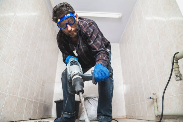 istock man in glasses works as perforator in pantry 1053532916