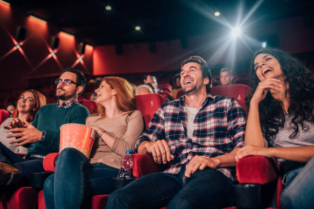 istock Happy friends at cinema 1053537610