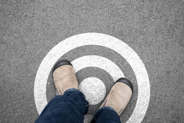 istock Brown shoes standing on the target destination point 1053539044