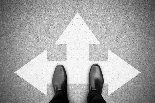 istock Businessman making decision at the crossroad 1053539990