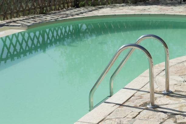 istock Isolated pool ladder - Swimming pool details (Marche, Italy, Europe) 1053541388