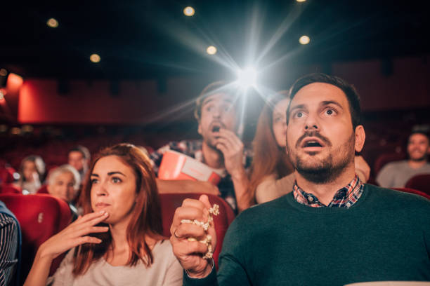 istock Young people at cinema 1053541784