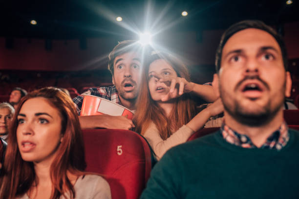 istock Scared young people at cinema 1053541922