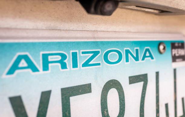 Moab, Utah - Close-up on the word 'Utah', at the top of a license plate for a vehicle registered in the state.