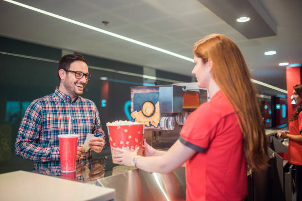 istock Man buying food at cinema 1053549498