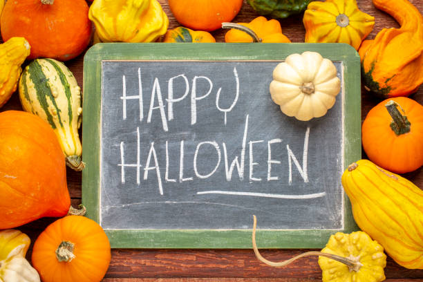 istock Happy Halloween on blackboard with squash 1053550894