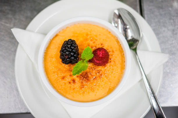 istock Creme Brule with fresh fruits band mint leaf 1053553562