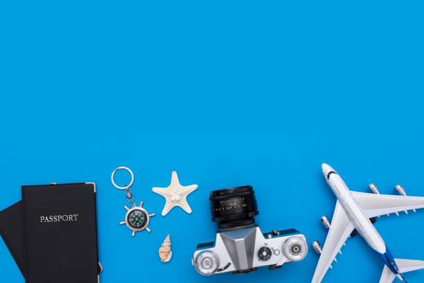 istock Summer Travel accessories on blue background 1053554226