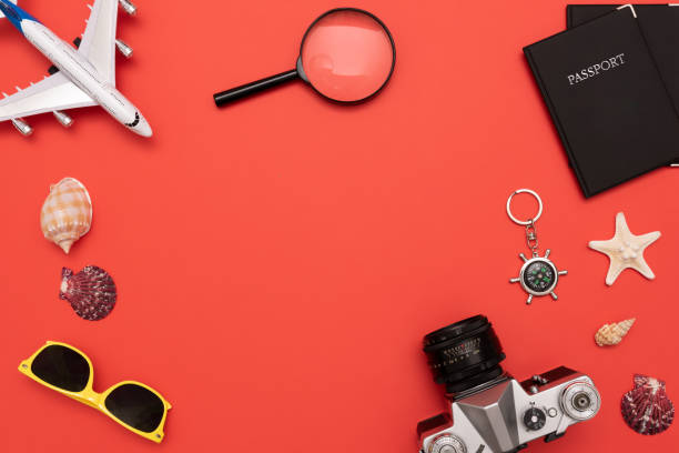 istock Summer Travel accessories on red background 1053554384