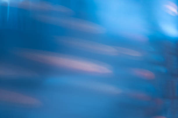blur abstract blue background defocused lens flare blurred abstract blue background. defocused lens flare. bokeh light stripes. intro music photos stock pictures, royalty-free photos & images