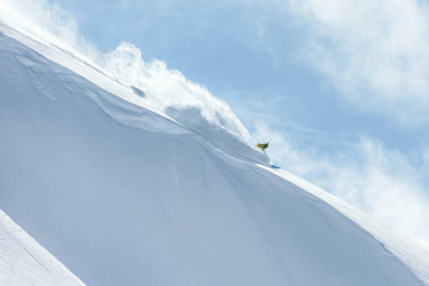 istock Extreme skier skiing on powder snow 1053568126
