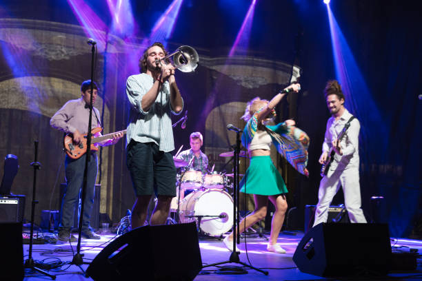 istock Rock group playing on the concert 1053575418