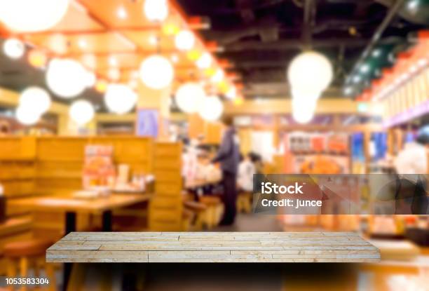 Empty Rock Shelf Display With Izakaya Japanese Restaurant Background Stock Photo - Download Image Now