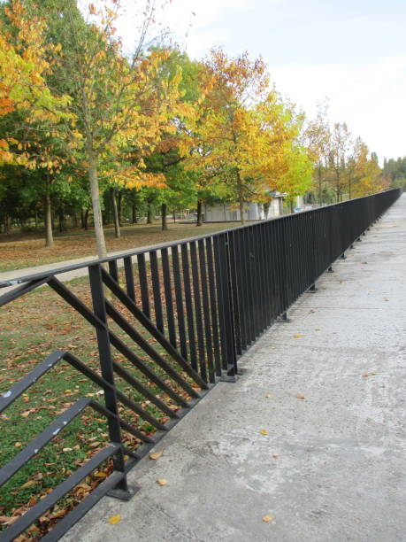 istock Railing in metal  Pedestrian path  Public park 1053588978