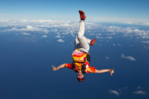 istock Sky diver falls over big lake 1053590548