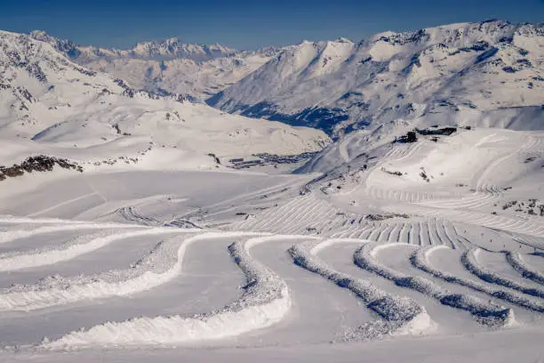 Photo of Compressed snow in beautiful lines. This is done to preserve the snow for the summer skiing months on a glacier. This glacier is in Tignes, in the Savoie in France