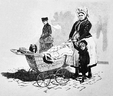 Nanny with a baby buggy and small child - 1888