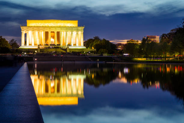 istock Lincoln Memorial after sunset with reflection pool in foreground 1053594500