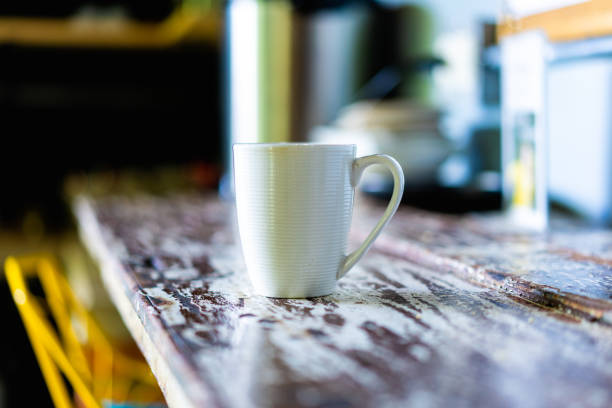 istock White coffee or tea mug on a vintage counter in a cozy kitchen 1053598376